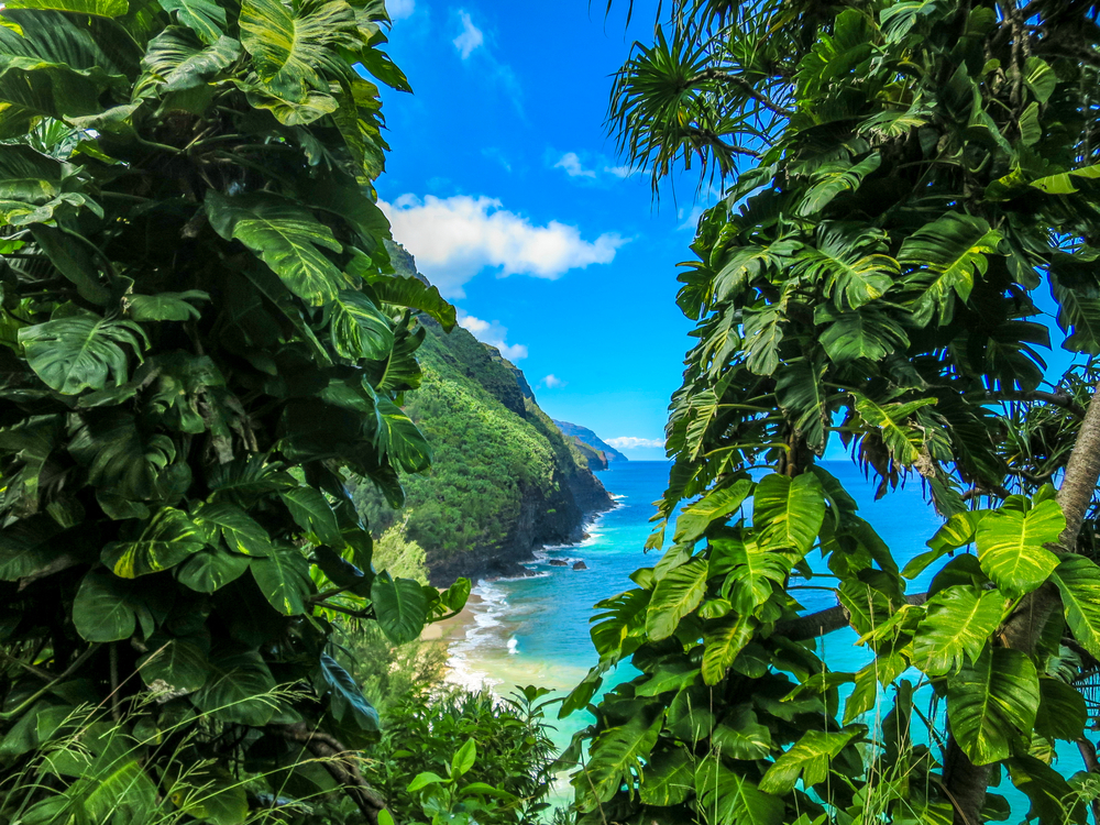 View from Nature's Window on the Kalalau Trail on Kauai for a guide detailing the best time to visit Hawaii with climate, prices, and events listed by month